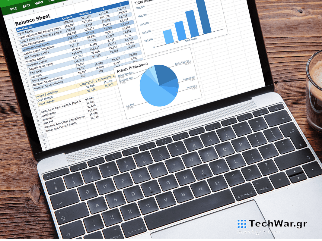 Microsoft Excel pulled up on a silver laptop.