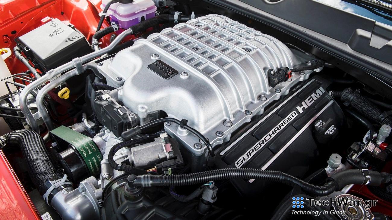 a silver engine inside a car