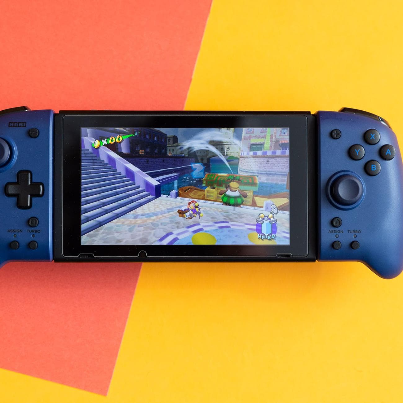 Hori's Split Pad Pro are connected to a Nintendo Switch that is displaying Super Mario Sunshine.