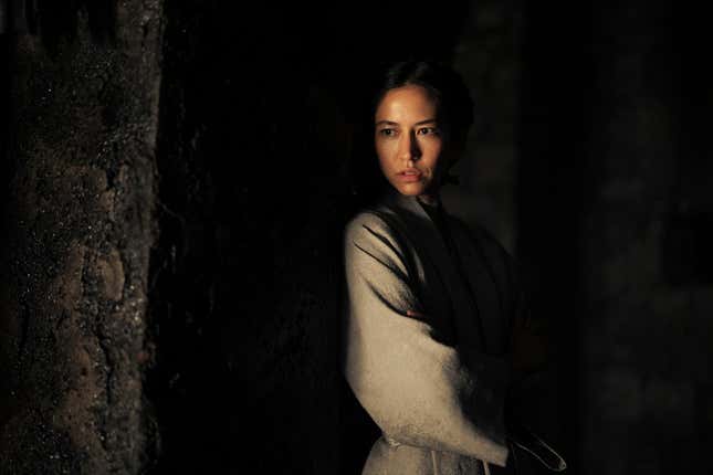 Mysaria (Sonoya Mizuno) skulks in the shadows.