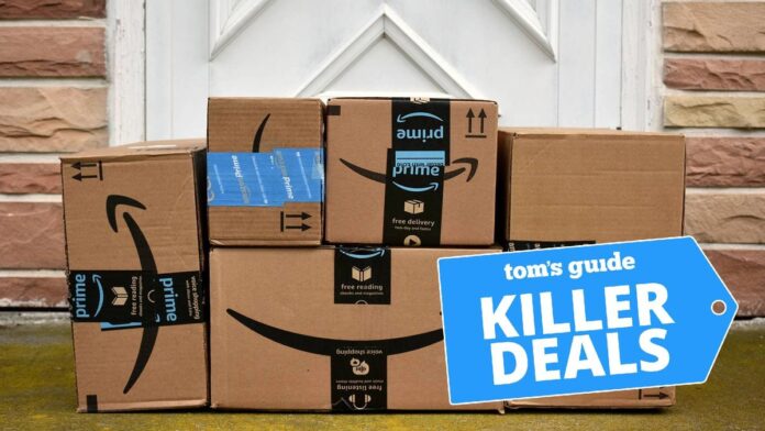 Amazon delivery boxes stacked outside a front door with a Tom