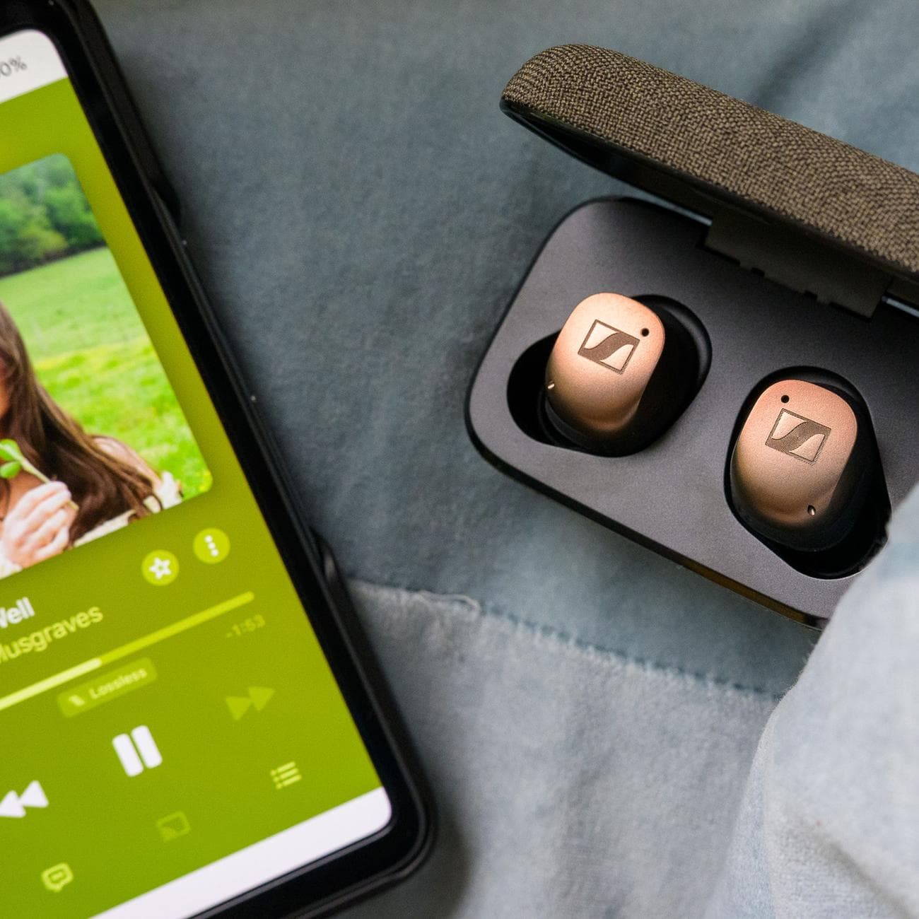 A photo of Sennheiser's Momentum True Wireless 4 earbuds in copper.