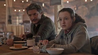 Ellie and Joel look at someone off camera in The Last of Us episode 6