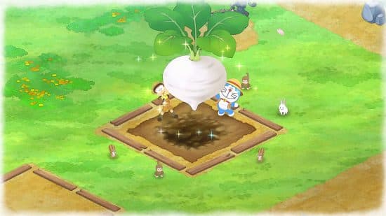 Καλύτερα αγροτικά παιχνίδια - Το Doraemon και ο παίκτης βγάζουν ένα γιγάντιο παστινάκι από το έδαφος στο Doraemon Story of Seasons Friends of the Great Kingdom.