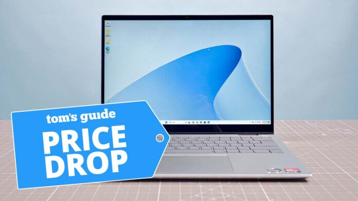 Dell Inspiron 14 2-in-1 shown on desk with homescreen