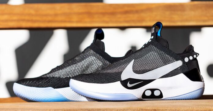 The Nike Adapt BB self-lacing basketball sneakers on a bench.