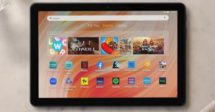 A close-up image of an Amazon Fire HD 10 tablet resting on a granite countertop from above.